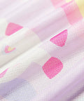 Close-up of Baby Safe Car Sun Shade mesh fabric with unicorn design, showing pink and white patterns, five-layer UV blocking material.