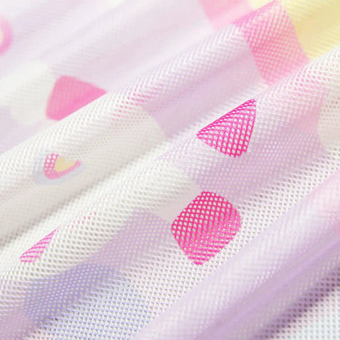 Close-up of Baby Safe Car Sun Shade mesh fabric with unicorn design, showing pink and white patterns, five-layer UV blocking material.