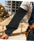 Heat Resistant Welding Sleeves Built For The Daily Grind Provide Flame Proof Arm Guards With.Snug Hook And Loop Closure To Keep Hands And Forearms Covered While You Grind In Black on a worker's arm at a construction site.