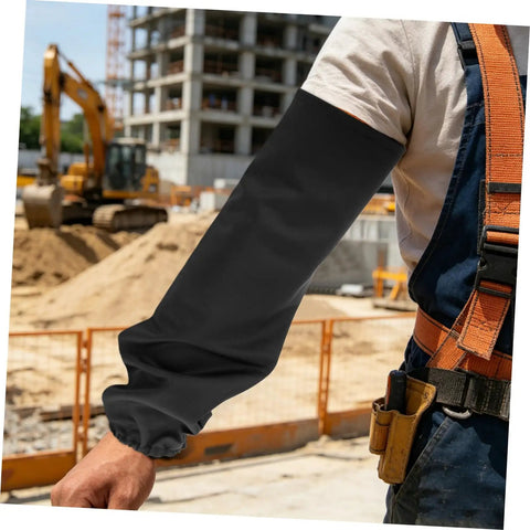 Heat Resistant Welding Sleeves Built For The Daily Grind Provide Flame Proof Arm Guards With.Snug Hook And Loop Closure To Keep Hands And Forearms Covered While You Grind In Black on a worker's arm at a construction site.