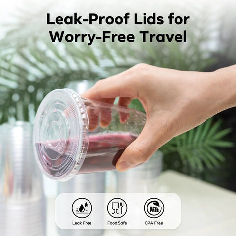 Hand holding a Clear 12 Oz Cup With Lid from 50 Pack For Iced Coffee Smoothies Milkshakes Juices featuring leak-proof BPA-Free PET Plastic