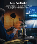 All In One Power Strip Tower With 15W Magnetic Wireless Charger And 1050J Surge Protector on table next to person gaming.