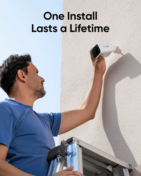 Man installing Solar Powered Outdoor Security Cam With 2K Resolution No Subscriptions Built In 8GB Storage Wireless Setup