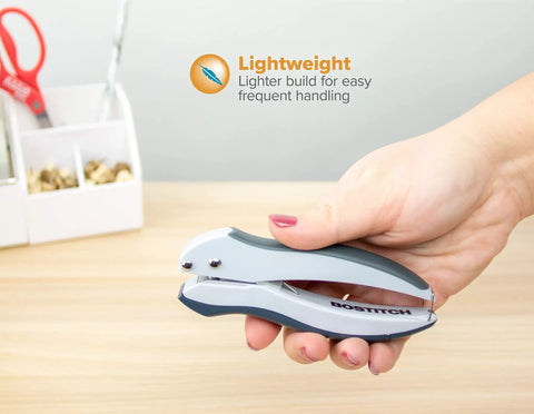EZ Squeeze One-Hole Paper Punch Pack of 3, 10 Sheet Capacity, lightweight design held in hand on wooden desk.