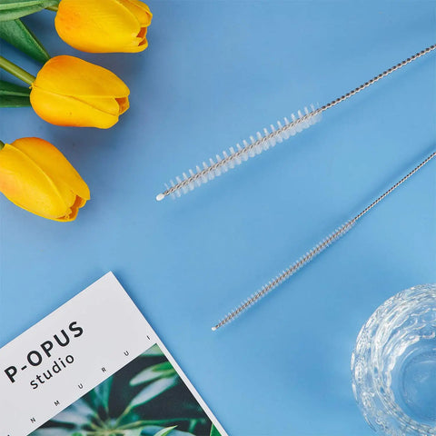 Four Piece Long Tube Brush Set For Cleaning Feeding Tubes And Straws 32 Inches Reach Nylon Bristles Soft Head Great For Narrow Passages And Stubborn Residue Easy Reach Cleaning Tool, long tube brush on blue background