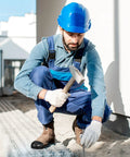 Worker on construction site wearing steel toe cap covers for shoes and work boots, tough as nails metatarsal protectors