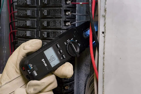 Technician using Open Jaw Voltage Continuity And Current Tester Workhorse 600 Volt And 100 Amp With LED Worklight Backlit Display CAT IV.