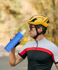 Cyclist using Ultra Lightweight Foldable Water Bottle For Hiking And Outdoor Adventures, Reusable Pouch With Food Grade TPU
