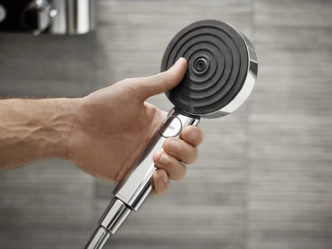Hand holding Pulsify S Handheld Shower Head Set With 3 Spray Modes QuickClean And Hose In Chrome 2.5 GPM