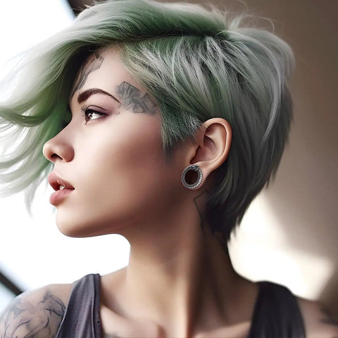 Profile view of a person wearing Dope Dragon Steel Ear Gauges 00G 10mm With Screw Back Stainless Steel Ear Tunnels Silver Tone With Diamond Accent