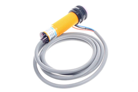 Diffuse Reflection Infrared Obstacle Avoidance Sensor With Adjustable 0 To 50 Cm Range, showing coiled cable and sensor unit