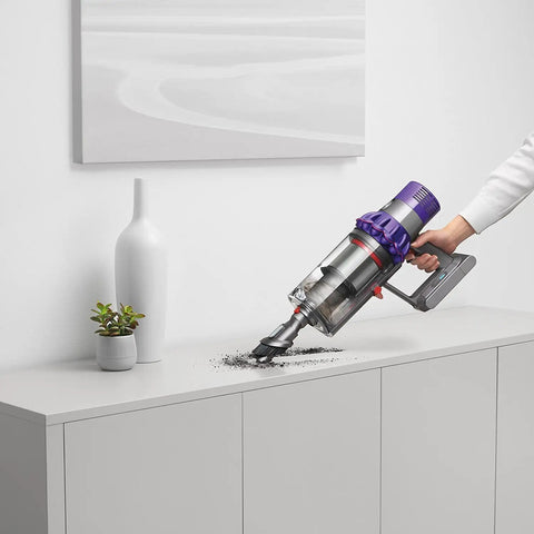 Cyclone V10 Animal Cordless Vacuum Cleaner With Quick Release Extension Hose Stubborn Dirt Brush cleaning top of cabinet