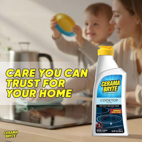 Glass Cooktop And Stove Top Cleaner Kit With Scraper, Razor, And Pad bottle on counter with family cooking in background
