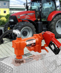 Heavy Duty 12V DC Fuel Transfer Pump 16 GPM Gasoline Extractor Kit For Tractors with nozzle on a metal tank.