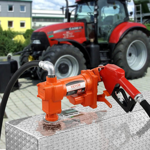Heavy Duty 12V DC Fuel Transfer Pump 16 GPM Gasoline Extractor Kit For Tractors with nozzle on a metal tank.