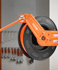 Kickass Retractable Air Hose Reel Auto Rewind 1/2 In X 50 Ft Hybrid Polymer Air Hose Max 300 Psi mounted in garage.