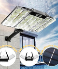 Solar Street Lights Outdoor with double big solar panels, 800 LEDs, adjustable angle mounted on a wall for illumination.
