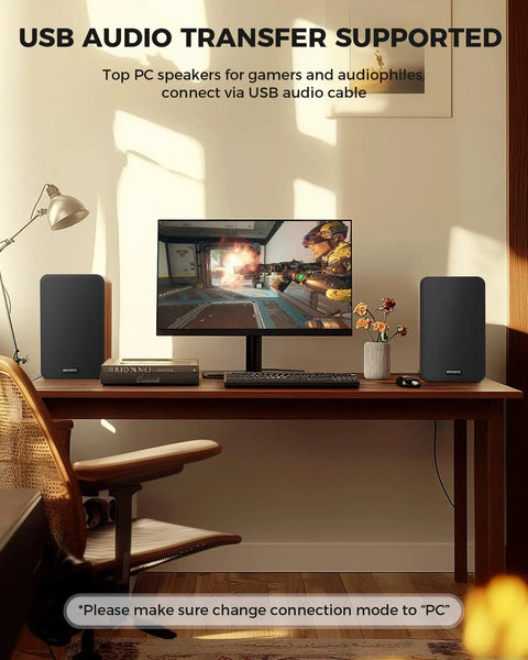 Workspace with PC and Beefy Bass Bookshelf Speakers 36W RMS BT Five Four Wireless Studio Monitors on desk next to monitor
