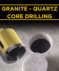 2-inch diamond masonry hole saw with yellow housing beside a concrete core hole