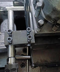 CNC Milling Extension Rod 25mm Shank ER25 Collet Holder Straight Chuck, 100mm Length attached to a CNC machine.
