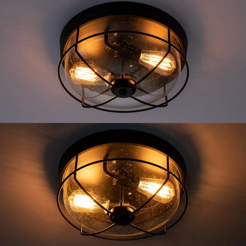 Industrial Black 13 Inch Flush Mount Ceiling Light With Seeded Glass Shade And Metal Cage For Kitchen Dining Room Foyer And Hallway Dope Vintage Farmhouse Vibe Ceiling Fixture illuminated view