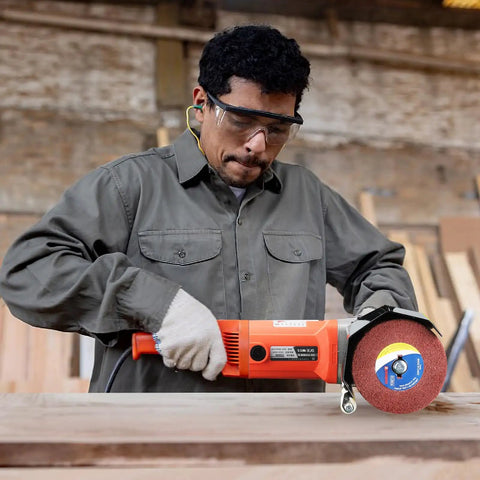 Worker using a Nonwoven Flap Wheel For Surface Conditioning 120 Grit Drum 120 X 100 X 19 Mm Heavy Duty Pro Grade on wood
