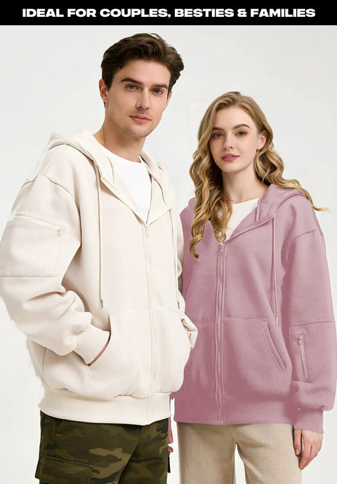 Man and woman wearing zip up hoodie with built in eye mask and multi pockets for travel unisex fleece sweatshirt airplane mode hoodie