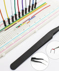 Real 20AWG Breadboard Jumpers Kit With ESD Tweezers, multi-color wires inserted into a breadboard for fast prototyping.