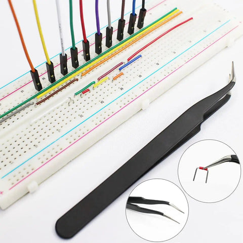 Real 20AWG Breadboard Jumpers Kit With ESD Tweezers, multi-color wires inserted into a breadboard for fast prototyping.