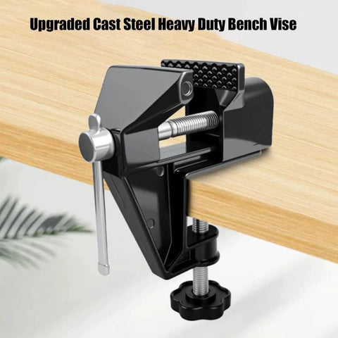 Heavy Duty Mini Work Bench Vise With Adjustable Quick Release Clamp for securing materials on a wooden table.
