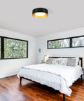 Modern Black And Gold Flush Mount Ceiling Light With Glass Drum Shade Close To Ceiling Round Fixture in bedroom setting
