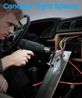 Man using heat gun near wires inside car, illustrating use of Helping Hands Soldering Station With Rock Solid 3.9 Inch Base.