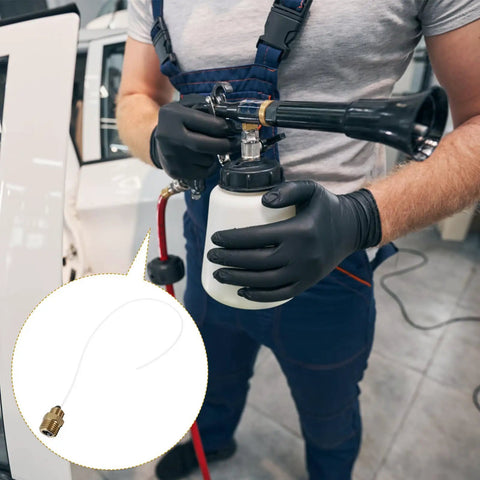 Heavy Duty Rotatable Flexible Air Blower Hose Kit For Car Maintenance And Washing held by technician, featuring spray nozzle and bottle.