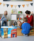 Hella Roomy Watercolor Storage Basket displayed in a playroom, storing toys and childrens' games, made from durable fabric.