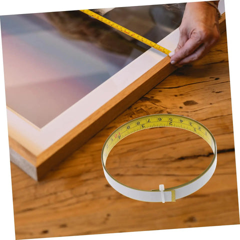 No Sweat Self Adhesive Measuring Ruler Tape 2 Pack For Industrial Workbenches And Cutting Tables on wood surface.