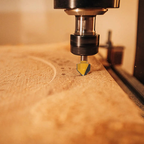 90 Degree V Groove And Round Nose Router Bit Set For Signmaking With 1/4 Inch Shank in use on wood surface