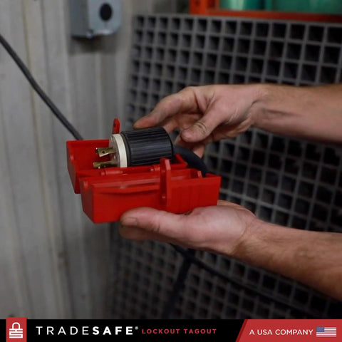 OSHA Compliant Lockout Tagout Kit With 25 Devices And Carrying Bag, plug lock being installed on industrial equipment