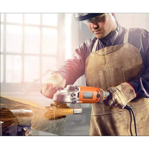 Person using Heavy Duty 15 Amp Corded 7 Inch Angle Grinder With Adjustable Twist Handle For Pro Level Metal Cutting And Concrete Grinding.