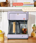 Total Game Changer Multi Brew Coffee Maker 12 Cup Glass Carafe Plus Single Serve Brewer For Pods Or Grounds Brews Over Ice No Fuss Touchscreen Dope Lavender Finish brewing iced coffee in glass.