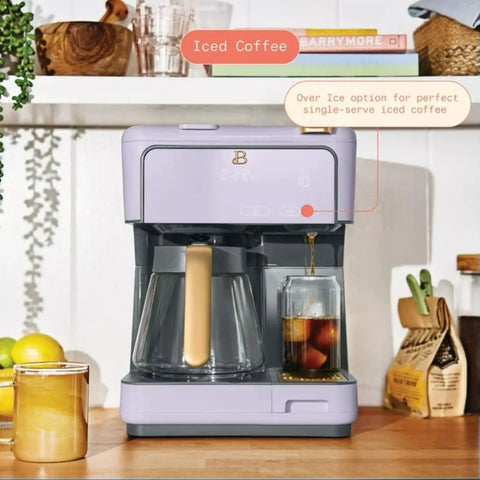 Total Game Changer Multi Brew Coffee Maker 12 Cup Glass Carafe Plus Single Serve Brewer For Pods Or Grounds Brews Over Ice No Fuss Touchscreen Dope Lavender Finish brewing iced coffee in glass.