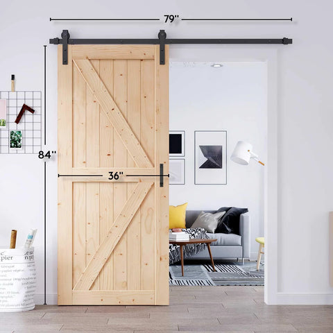 36 Inch By 84 Inch Solid Spruce Sliding Barn Door With A Six Point Six Foot Hardware Kit And Included Handle Installed in Home