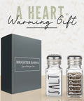 Clear Glass Salt And Pepper Shaker Set With Stainless Steel Lids for Modern Farmhouse Kitchen Decor next to gift box