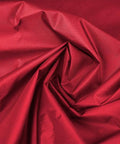 Close-up of red 190T polyester fabric for Three Seat Patio Swing Cushion Cover Replacement For Outdoor Hammock Durable 190T Polyester Tear Resistant