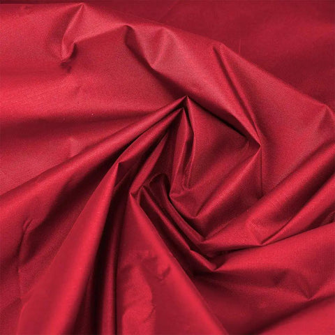 Close-up of red 190T polyester fabric for Three Seat Patio Swing Cushion Cover Replacement For Outdoor Hammock Durable 190T Polyester Tear Resistant