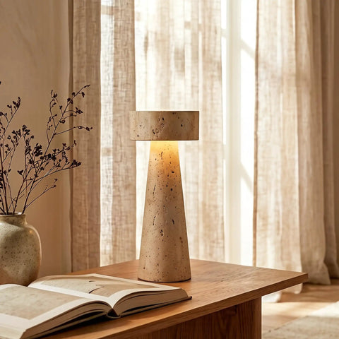 Travertine Stone Table Lamp With Warm White LED, Japanese Wabi Sabi Mushroom Nightstand Light on wooden desk near open book