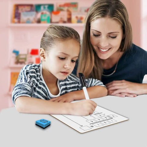 Child using Two Pack Dry Erase Math Boards For Multiplication And Division With Charts, Kid Friendly Whiteboards for practice