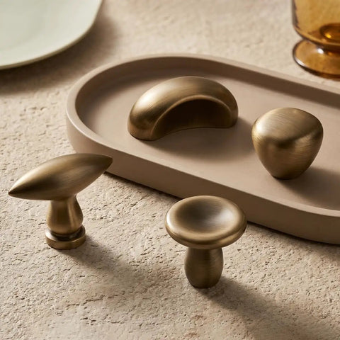 Dope 2 Pack French Antique Brass Mushroom Cabinet Knobs 1.18 Inch Zinc Alloy Drawer Knobs displayed on a beige tray.