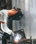 Heavy Duty Heat Resistant Aluminum Foil Arm Sleeves, Waterproof Cut Resistant Forearm Guards Shop Tough Armor For Welders Mechanics And Garage Grinders, 2 Pack. Worker wearing sleeve while welding.