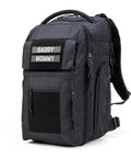 Everyday Tactical Diaper Bag Backpack For Dads With Changing Mat Stroller Straps Built In Magnetic Wipes Pocket Cooler Pouch Thermal Pocket And Snack Space Black Everyday. Black backpack with multiple compartments and 'Daddy Mommy' labels.