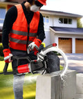 Badass 9000W Corded Concrete Saw With Linkage Water Pump For Zero Dust Slash Brick Cement And Masonry cutting through concrete block with water spray.